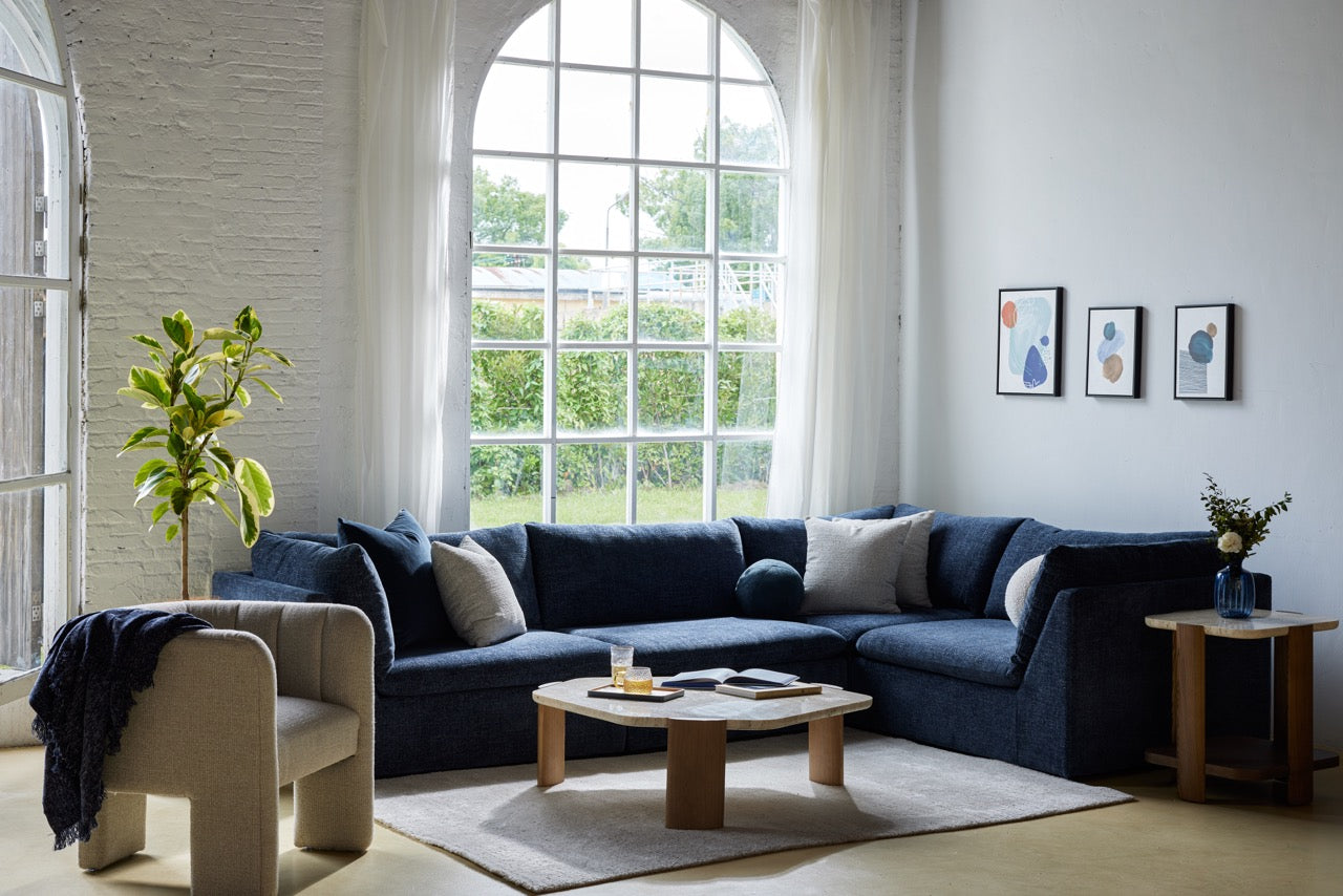 Image shows a living room with a beautiful sofa, rug and the Matthew Occasional Chair